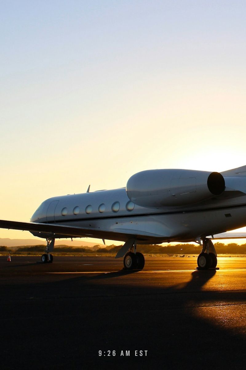 a plane on a runway at 10am